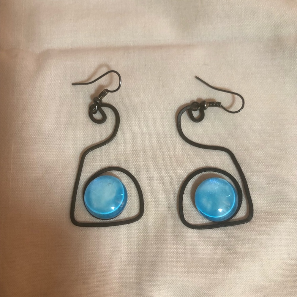 Unique earring with blue/green stone.